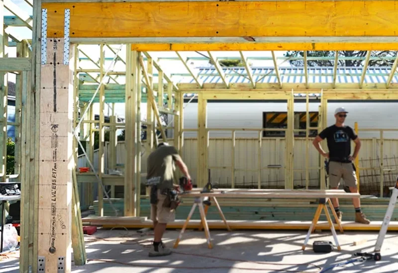 Wall bracing and tie-down structural design — braced timber frame with LVL beam and tie-down straps